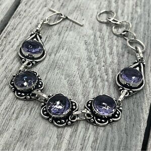 325. Faceted Amethyst Sterling Artisan Link Bracelet.